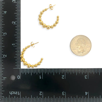 SPHERES ON HOOP EARRINGS