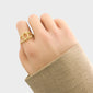 TWISTED LOOP RING